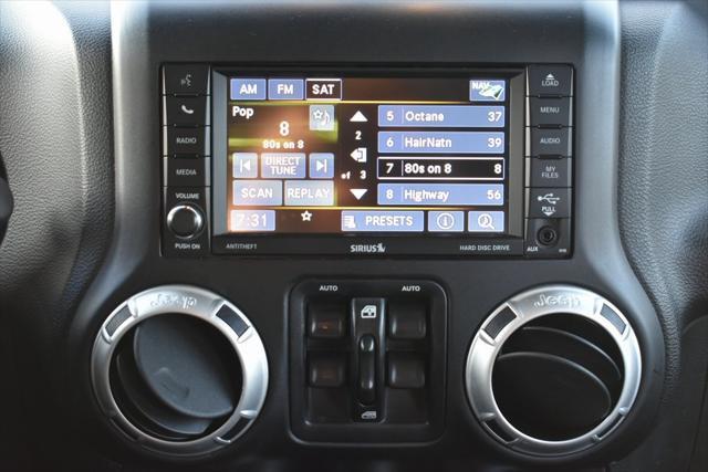 used 2016 Jeep Wrangler Unlimited car, priced at $19,299
