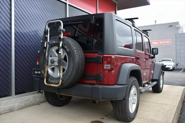 used 2013 Jeep Wrangler Unlimited car, priced at $19,048