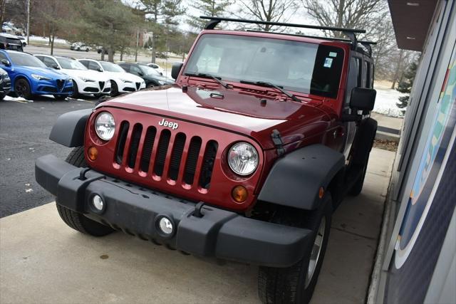 used 2013 Jeep Wrangler Unlimited car, priced at $19,048