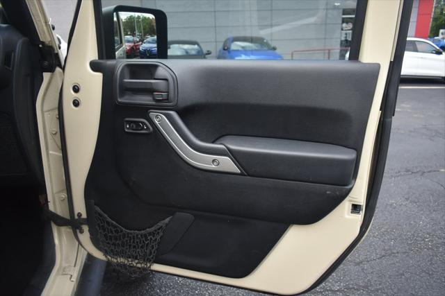 used 2011 Jeep Wrangler Unlimited car, priced at $17,942