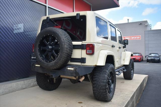 used 2011 Jeep Wrangler Unlimited car, priced at $17,942