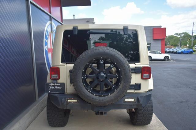 used 2011 Jeep Wrangler Unlimited car, priced at $17,942