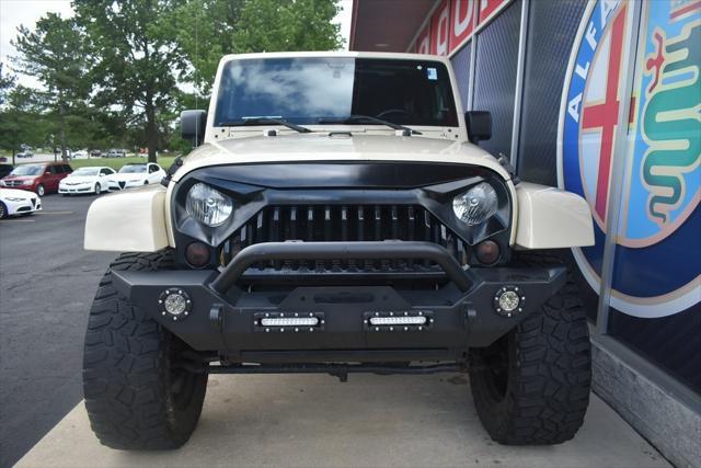 used 2011 Jeep Wrangler Unlimited car, priced at $17,942