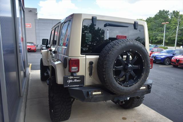 used 2011 Jeep Wrangler Unlimited car, priced at $17,942