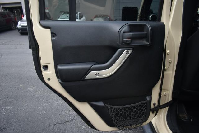 used 2011 Jeep Wrangler Unlimited car, priced at $17,942