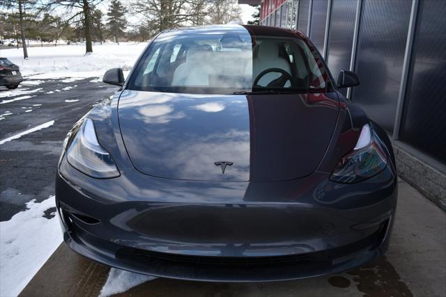 used 2023 Tesla Model 3 car, priced at $31,427