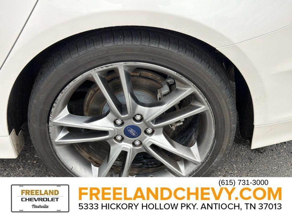 used 2015 Ford Fusion car, priced at $7,998