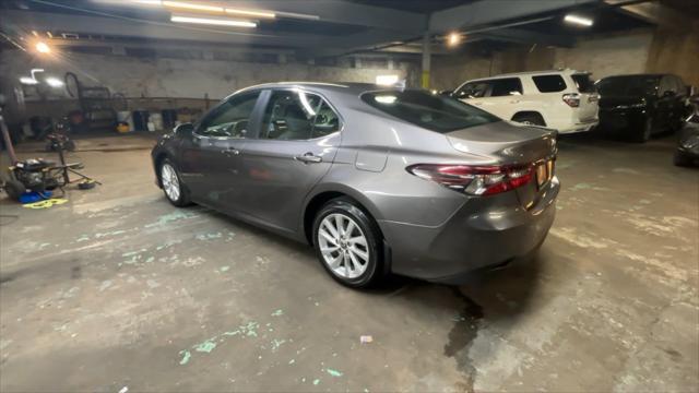 used 2021 Toyota Camry car, priced at $22,649