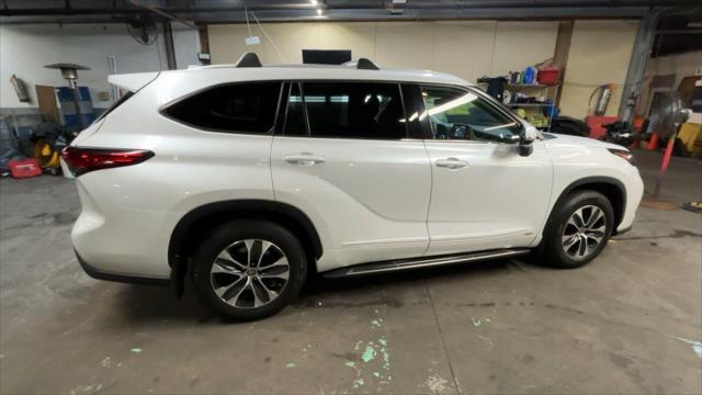 used 2022 Toyota Highlander Hybrid car, priced at $40,787