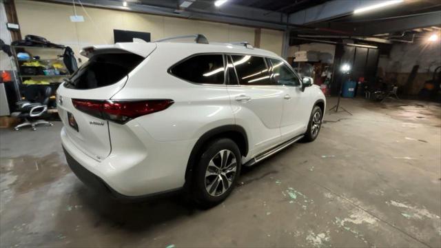 used 2022 Toyota Highlander Hybrid car, priced at $40,787