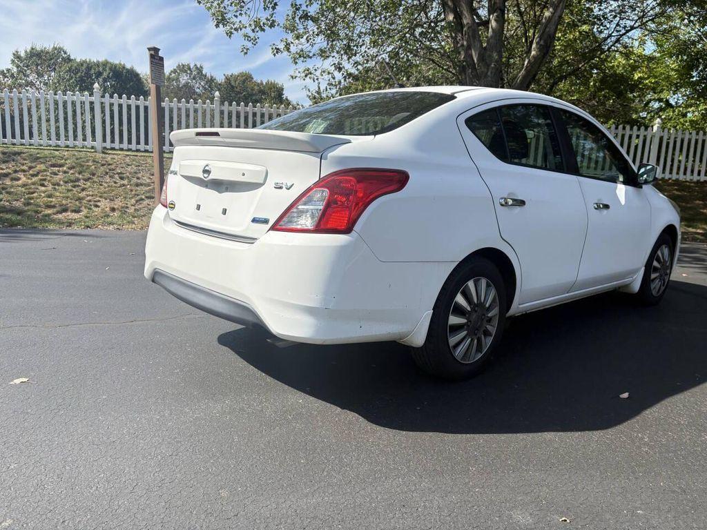used 2015 Nissan Versa car, priced at $4,999