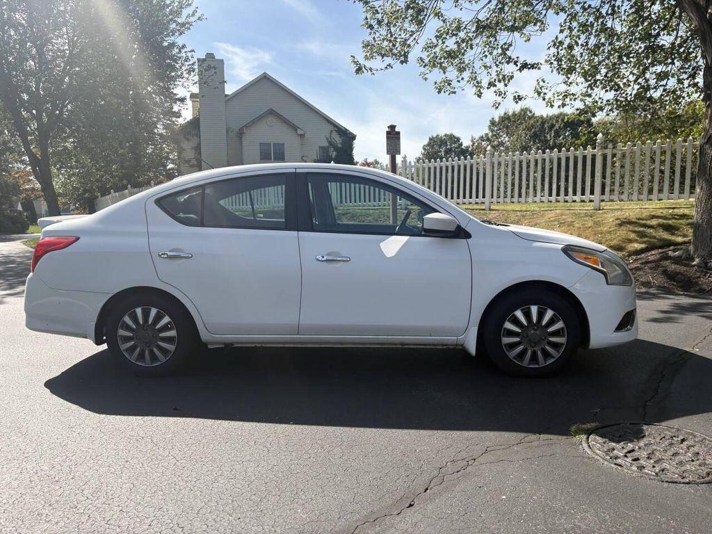 used 2015 Nissan Versa car, priced at $4,999