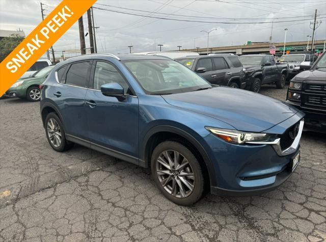 used 2021 Mazda CX-5 car, priced at $25,000