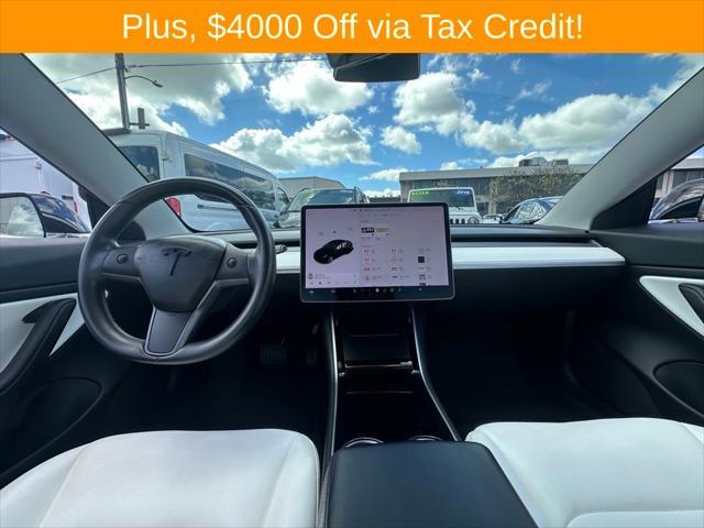 used 2018 Tesla Model 3 car, priced at $28,000