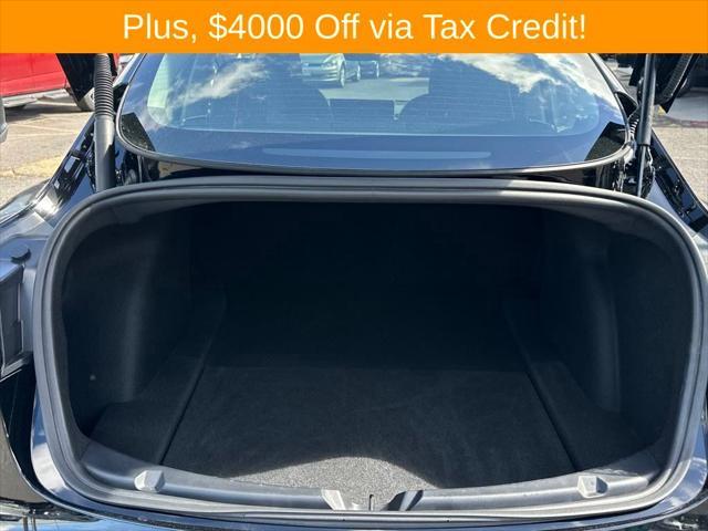 used 2022 Tesla Model 3 car, priced at $30,000