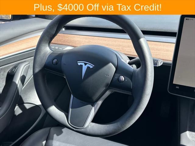 used 2022 Tesla Model 3 car, priced at $30,000