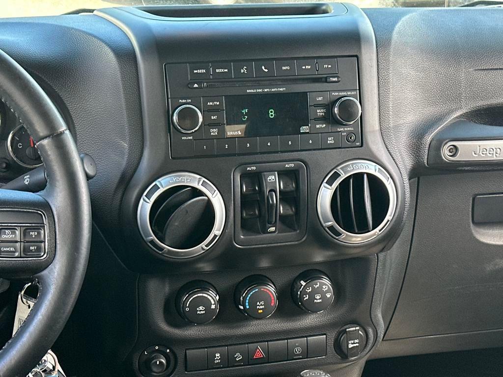 used 2015 Jeep Wrangler Unlimited car, priced at $15,000