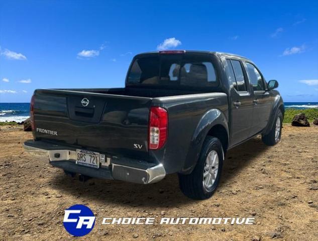 used 2014 Nissan Frontier car, priced at $15,000