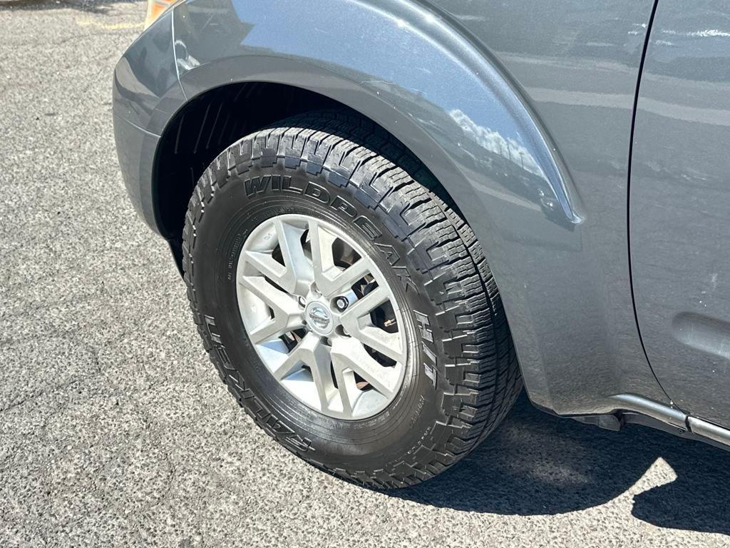 used 2014 Nissan Frontier car, priced at $15,000