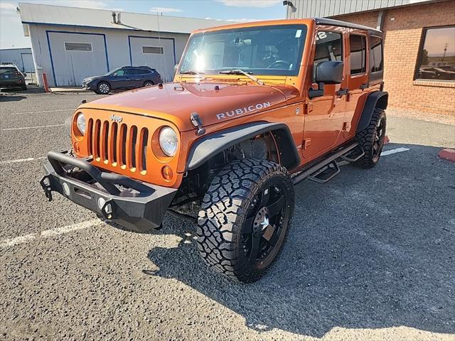 used 2011 Jeep Wrangler Unlimited car, priced at $16,490