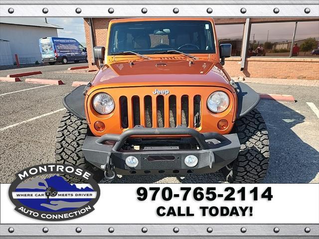used 2011 Jeep Wrangler Unlimited car, priced at $16,490