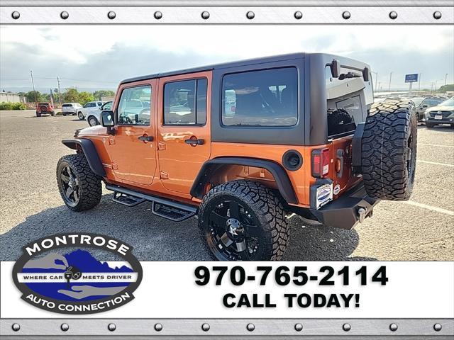 used 2011 Jeep Wrangler Unlimited car, priced at $16,490