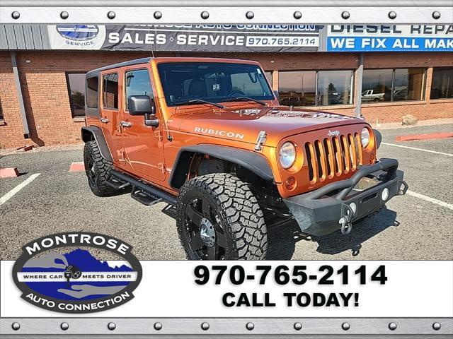 used 2011 Jeep Wrangler Unlimited car, priced at $16,490