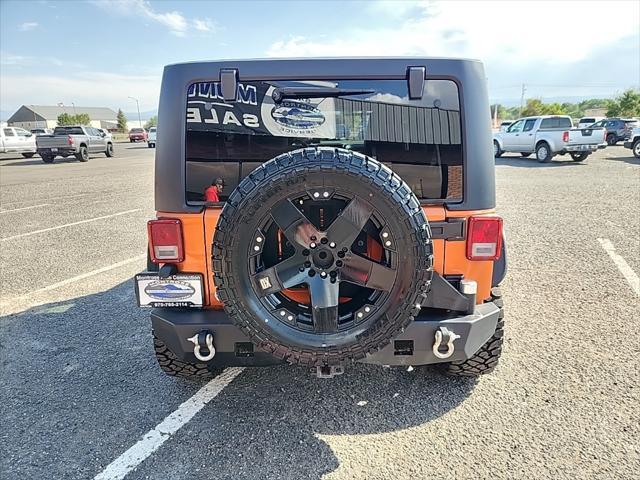 used 2011 Jeep Wrangler Unlimited car, priced at $16,490