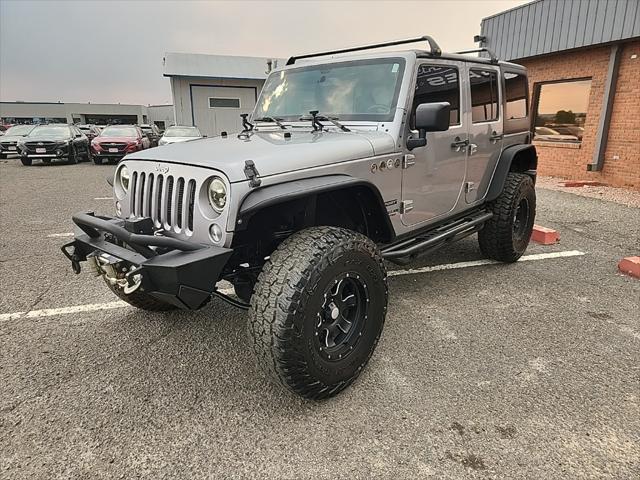 used 2015 Jeep Wrangler Unlimited car, priced at $19,490