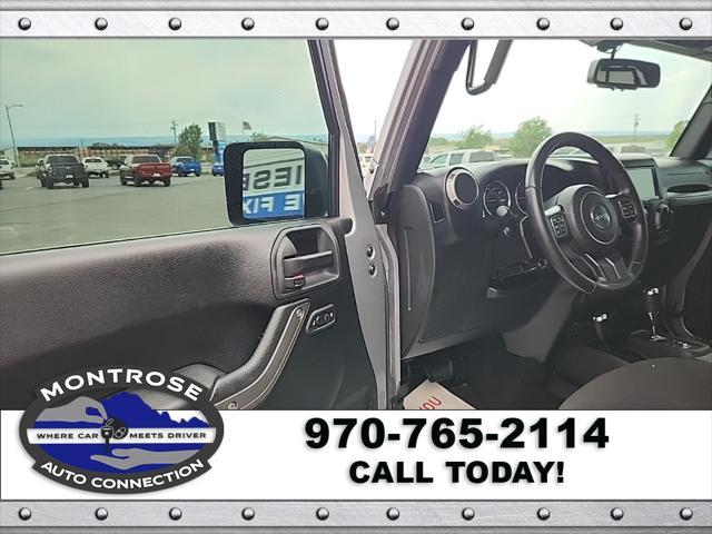 used 2015 Jeep Wrangler Unlimited car, priced at $19,490
