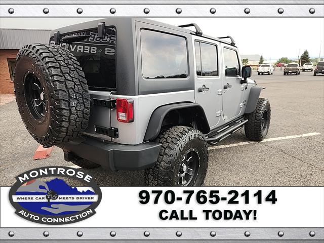 used 2015 Jeep Wrangler Unlimited car, priced at $19,490