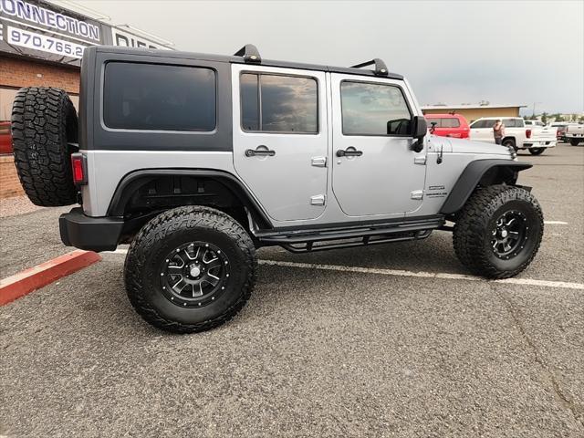 used 2015 Jeep Wrangler Unlimited car, priced at $19,490