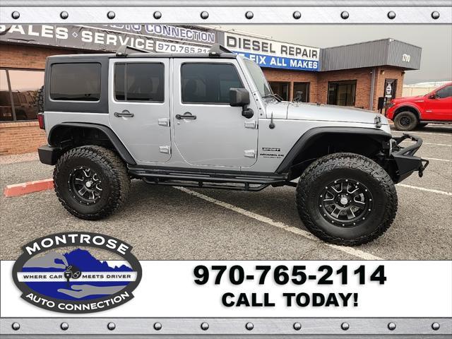 used 2015 Jeep Wrangler Unlimited car, priced at $19,490