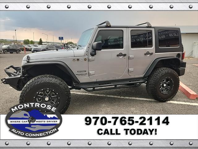 used 2015 Jeep Wrangler Unlimited car, priced at $19,490