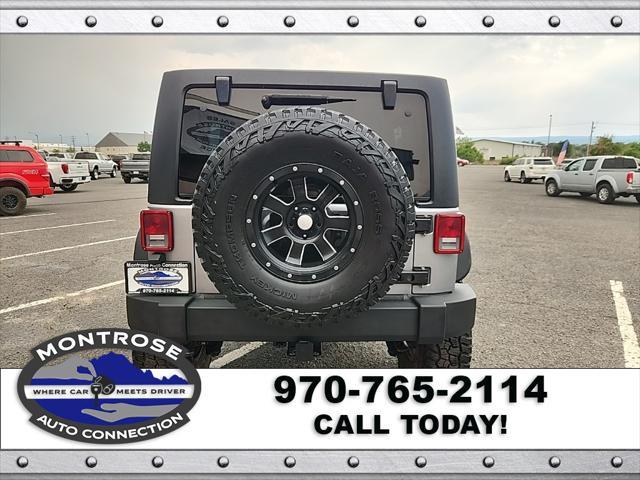 used 2015 Jeep Wrangler Unlimited car, priced at $19,490