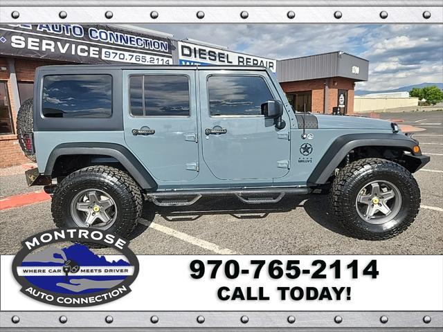 used 2015 Jeep Wrangler Unlimited car, priced at $23,490