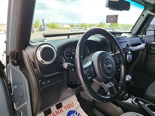 used 2015 Jeep Wrangler Unlimited car, priced at $23,490