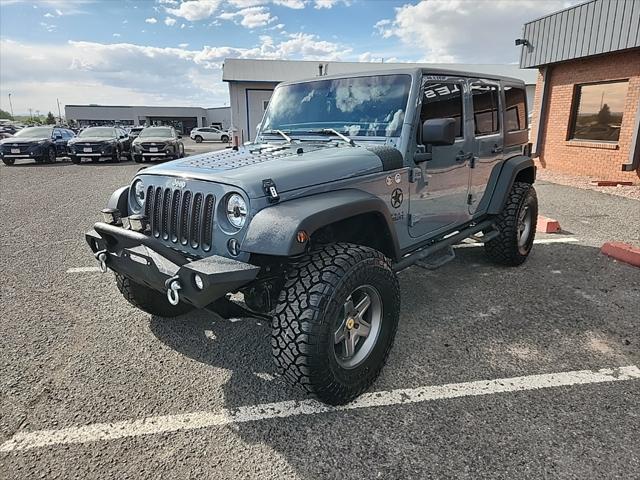 used 2015 Jeep Wrangler Unlimited car, priced at $23,490