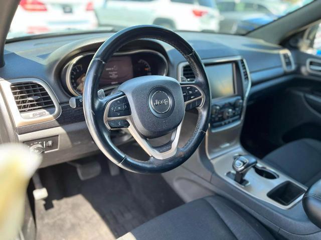 used 2014 Jeep Grand Cherokee car, priced at $13,995