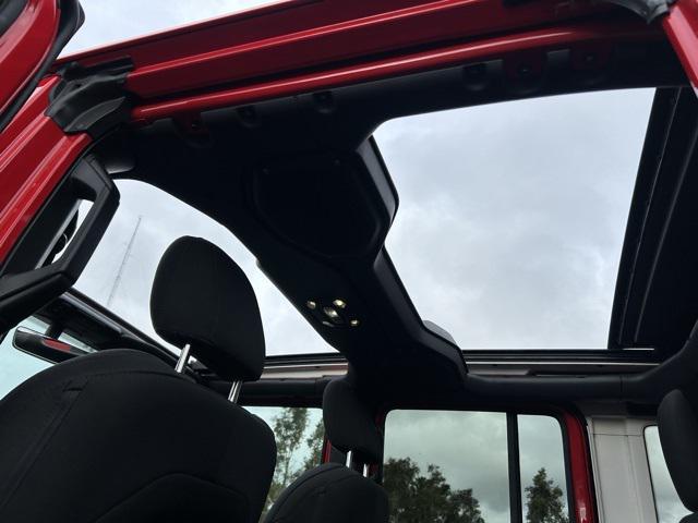 used 2021 Jeep Wrangler Unlimited car, priced at $32,350