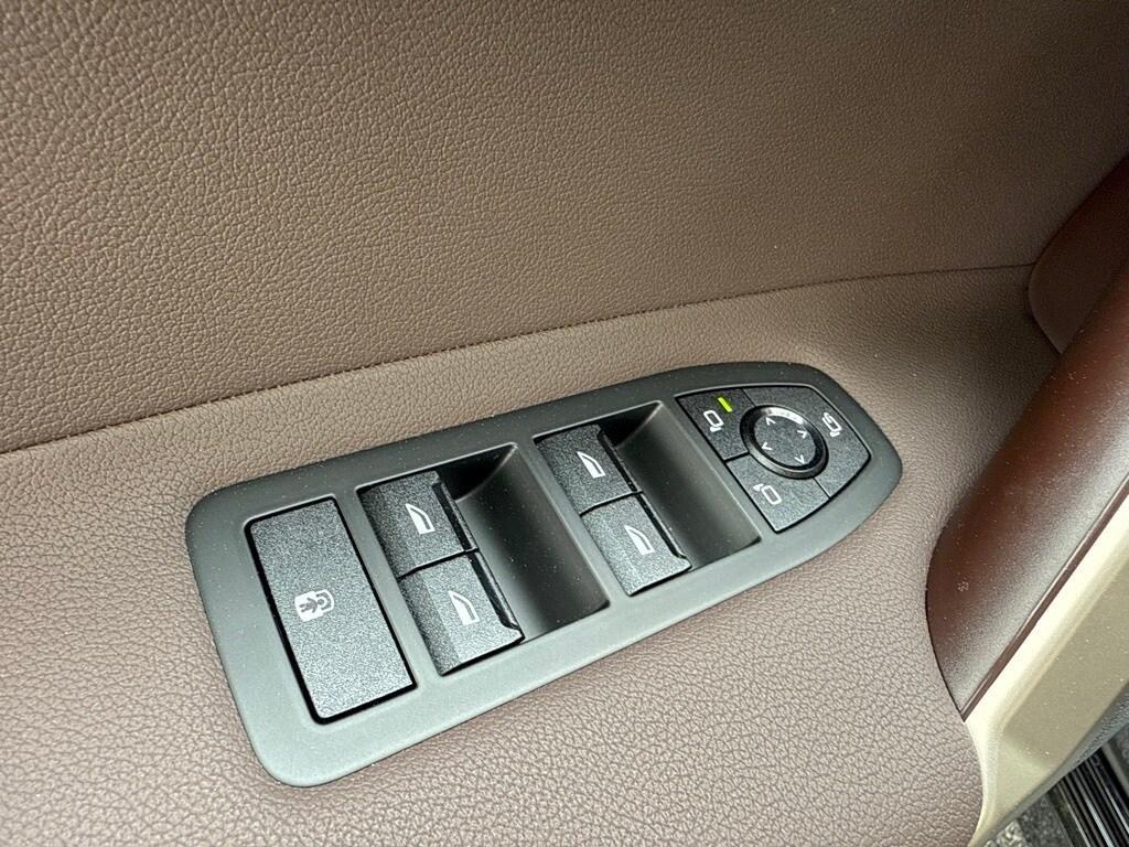 new 2026 BMW iX car, priced at $83,025