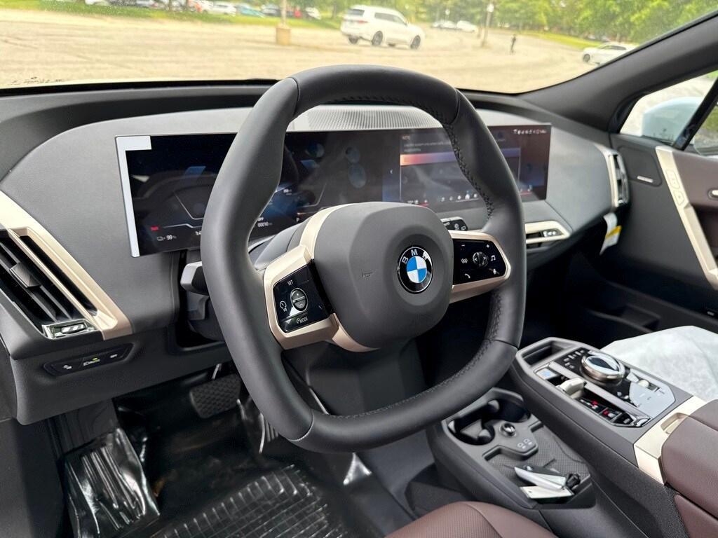 new 2026 BMW iX car, priced at $83,025