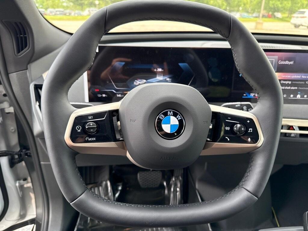 new 2026 BMW iX car, priced at $83,025