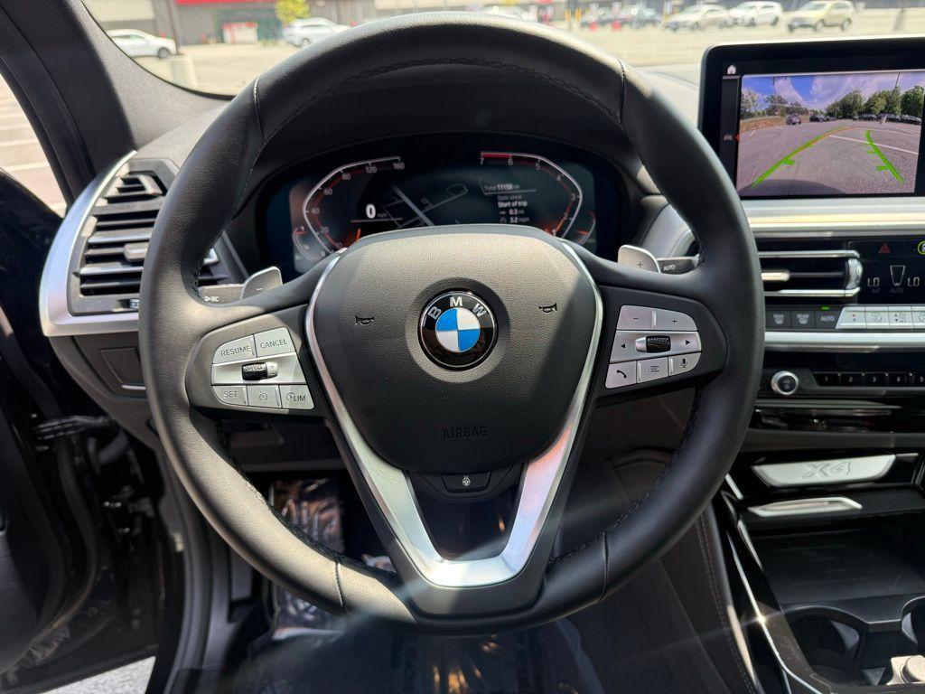 used 2025 BMW X4 car, priced at $54,670