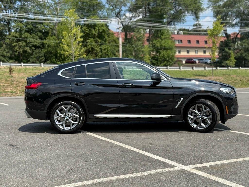 used 2025 BMW X4 car, priced at $54,670