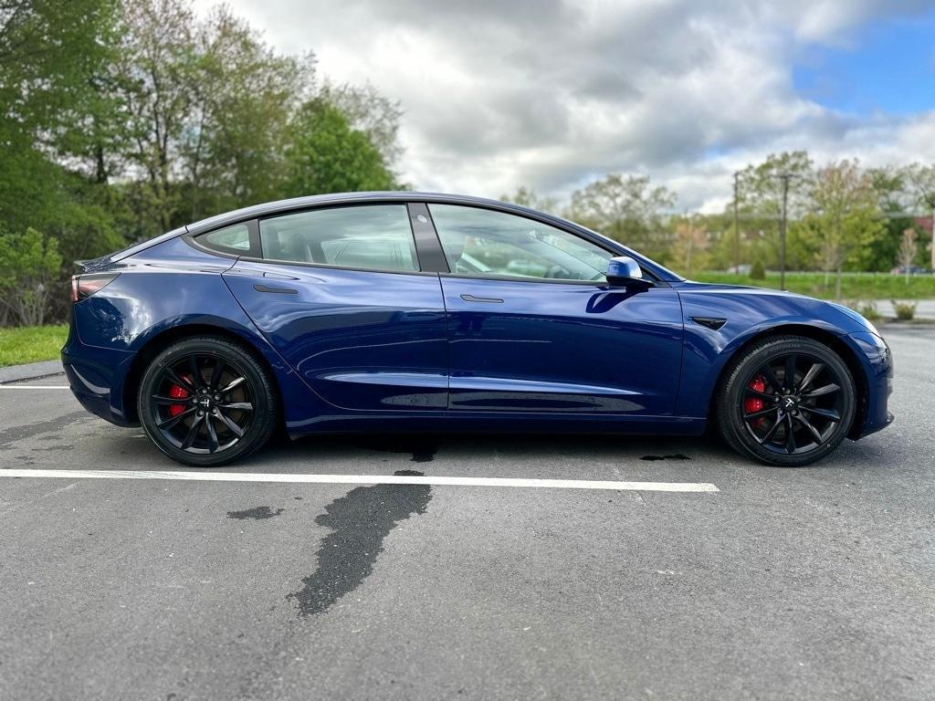 used 2023 Tesla Model 3 car, priced at $33,980