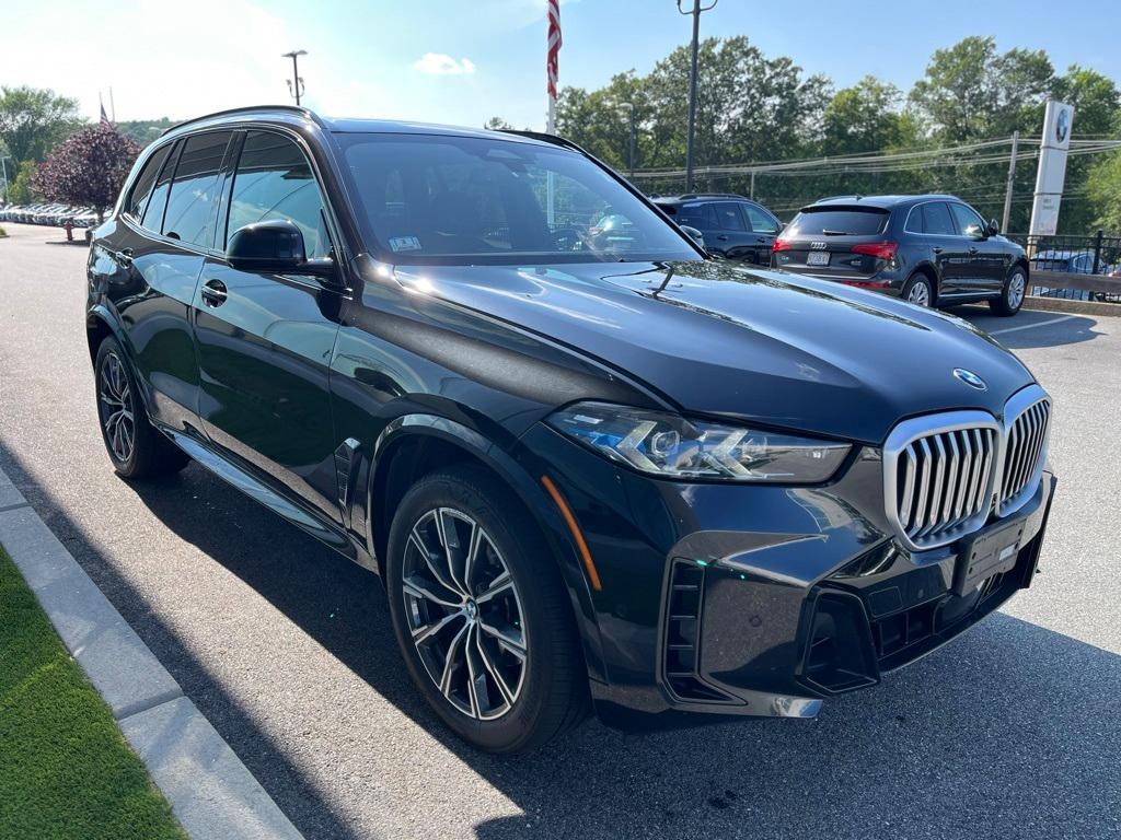 used 2024 BMW X5 car, priced at $61,000