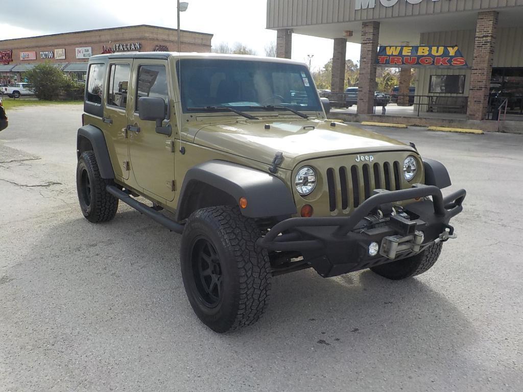 used 2011 Jeep Wrangler Unlimited car, priced at $12,995