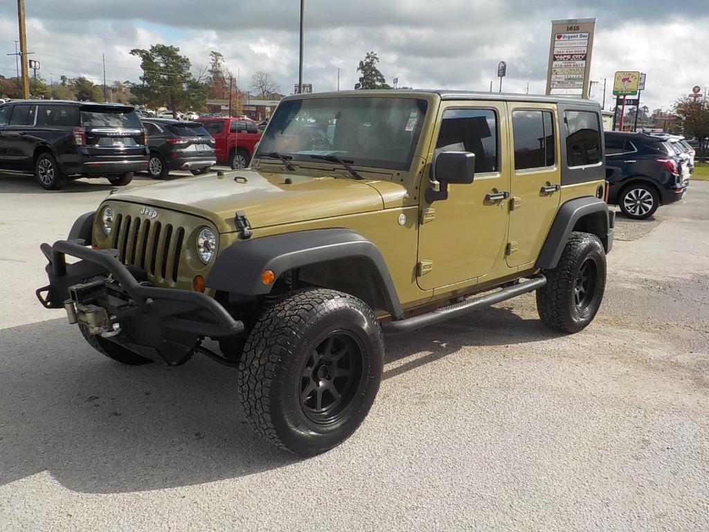 used 2011 Jeep Wrangler Unlimited car, priced at $12,995