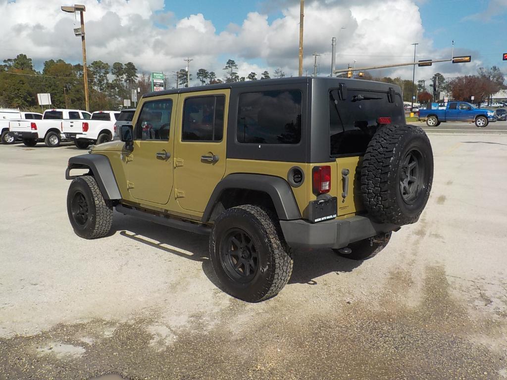 used 2011 Jeep Wrangler Unlimited car, priced at $12,995